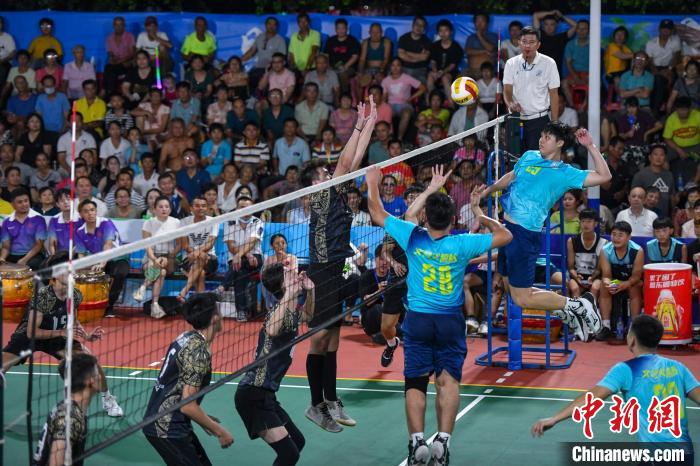 文昌以球会友：村VA赛事携手马来西亚华侨排球队